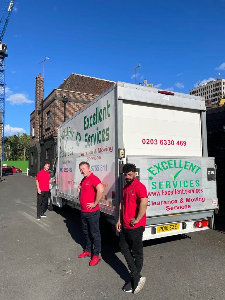 Excellent Movers team loading furniture for removals
